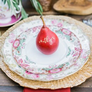red pear on Red place setting